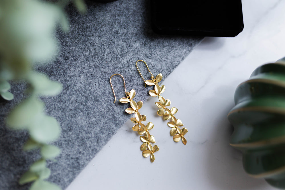 
                  
                    Orchid Chain Earrings
                  
                